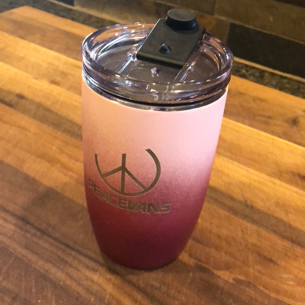 Doubled walled insulated travel mug.  12 oz